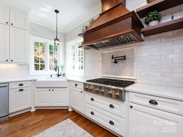1509 Churchill Downs Dr, Waxhaw, NC 28173 - kitchen featuring a sink, appliances with stainless steel finishes, custom exhaust hood, open shelves, and backsplash