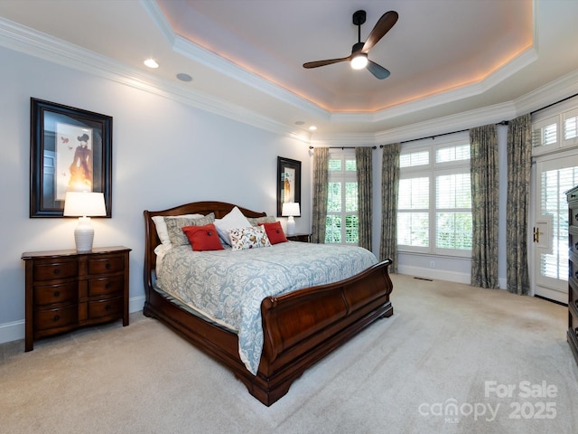 1509 Churchill Downs Dr, Waxhaw, NC 28173 - carpeted bedroom featuring a raised ceiling, ornamental molding, baseboards, ceiling fan, and recessed lighting