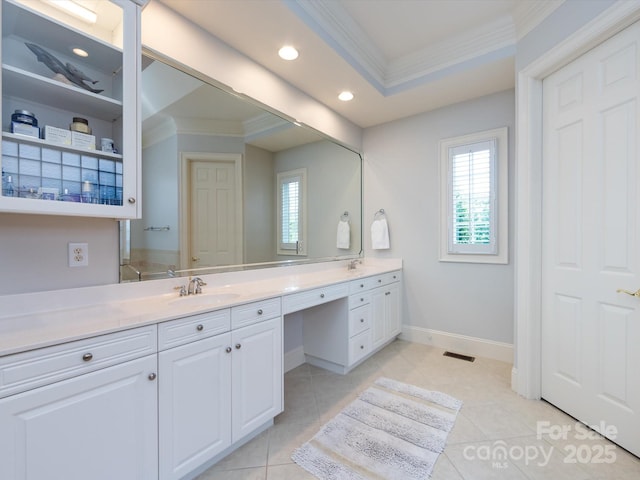 1509 Churchill Downs Dr, Waxhaw, NC 28173 - bathroom featuring crown molding, double vanity, recessed lighting, tile patterned flooring, and baseboards