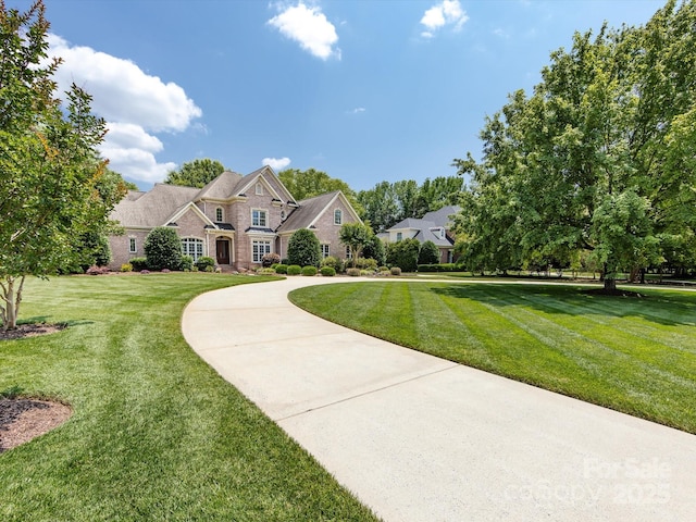 1509 Churchill Downs Dr, Waxhaw, NC 28173 - view of front of home featuring a front lawn and curved driveway