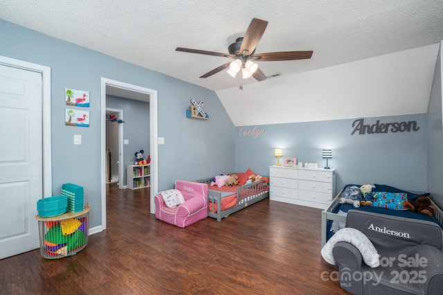 107 Ingonish Dr, Gastonia, NC 28056 - bedroom with vaulted ceiling, wood finished floors, a textured ceiling, and ceiling fan