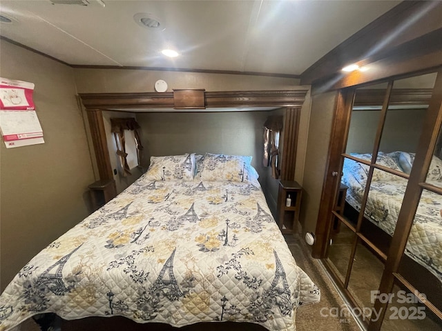 5400 Little River Neck Rd Unit 169, North Myrtle Beach, SC 29582 - bedroom with dark colored carpet