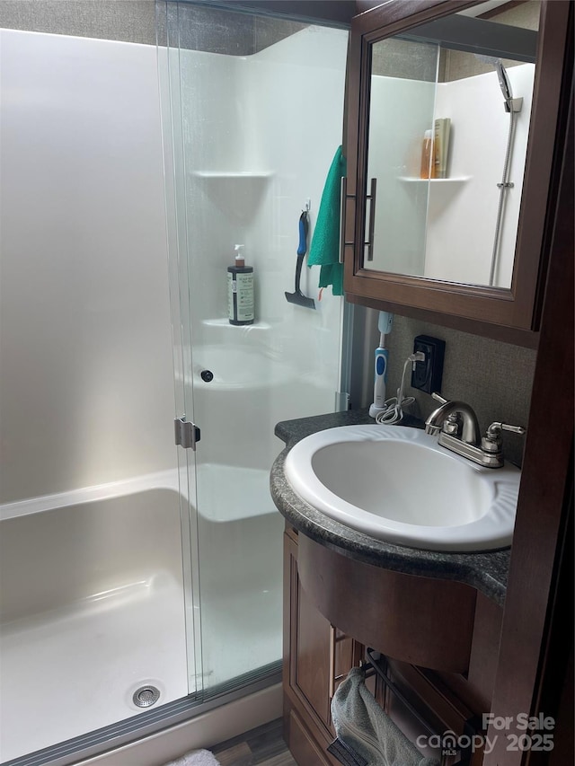 5400 Little River Neck Rd Unit 169, North Myrtle Beach, SC 29582 - full bathroom featuring a shower stall and vanity