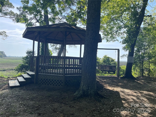 5400 Little River Neck Rd Unit 169, North Myrtle Beach, SC 29582 - wooden deck featuring a gazebo