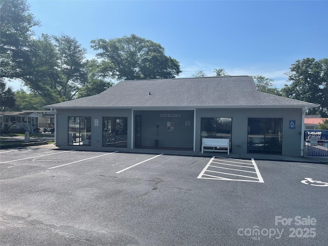 5400 Little River Neck Rd Unit 169, North Myrtle Beach, SC 29582 - view of building exterior with uncovered parking