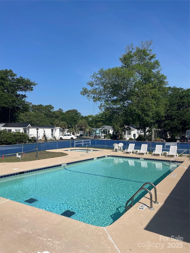 5400 Little River Neck Rd Unit 169, North Myrtle Beach, SC 29582 - community pool with a patio area