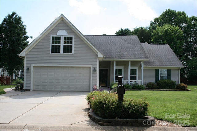 4711 Lenox Hill Pl Unit 98, Charlotte, NC 28269 - traditional home with concrete driveway, a front yard, covered porch, a garage, and roof with shingles