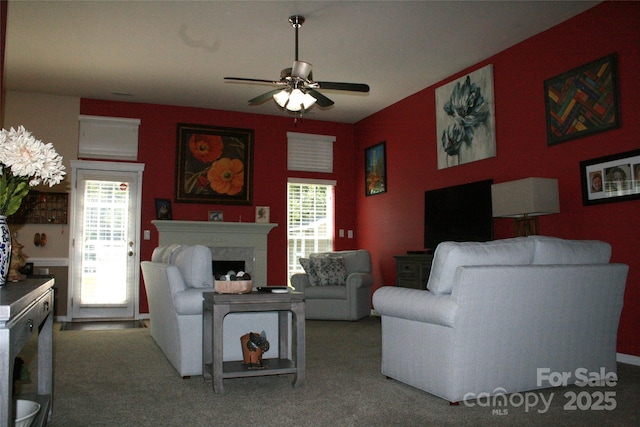 4711 Lenox Hill Pl Unit 98, Charlotte, NC 28269 - living area with ceiling fan, plenty of natural light, a fireplace, and carpet floors