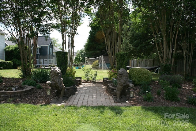 4711 Lenox Hill Pl Unit 98, Charlotte, NC 28269 - view of yard with a patio area