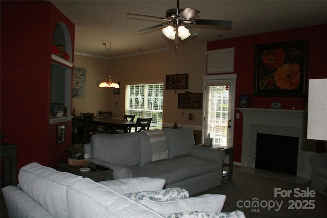 4711 Lenox Hill Pl Unit 98, Charlotte, NC 28269 - living area with a chandelier, ceiling fan, a fireplace, and crown molding