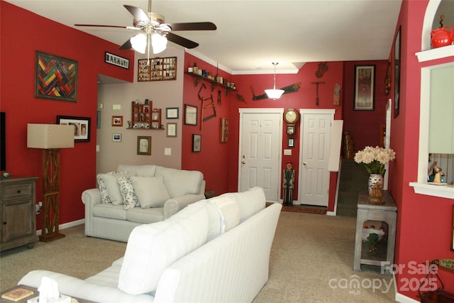 4711 Lenox Hill Pl Unit 98, Charlotte, NC 28269 - living area featuring a ceiling fan, light carpet, and baseboards