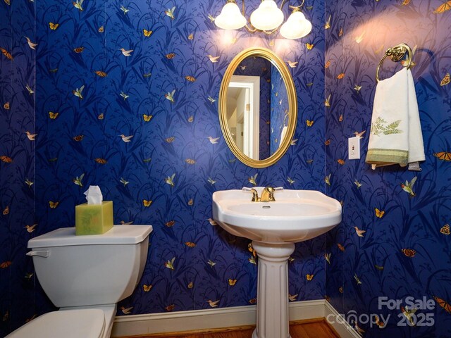 1209 S S St, Gastonia, NC 28052 - half bathroom with wallpapered walls, baseboards, and toilet
