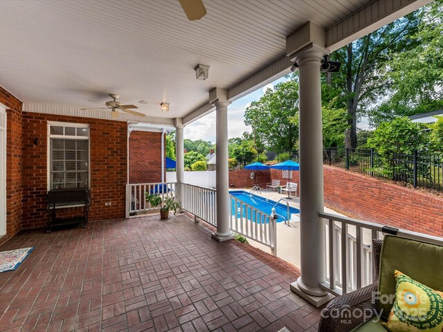 1209 S S St, Gastonia, NC 28052 - fenced backyard with a ceiling fan and a patio area