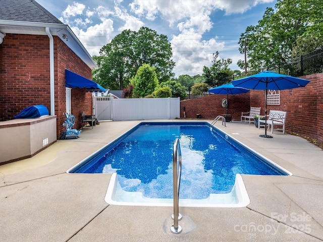 1209 S S St, Gastonia, NC 28052 - view of pool with a patio area and a fenced backyard