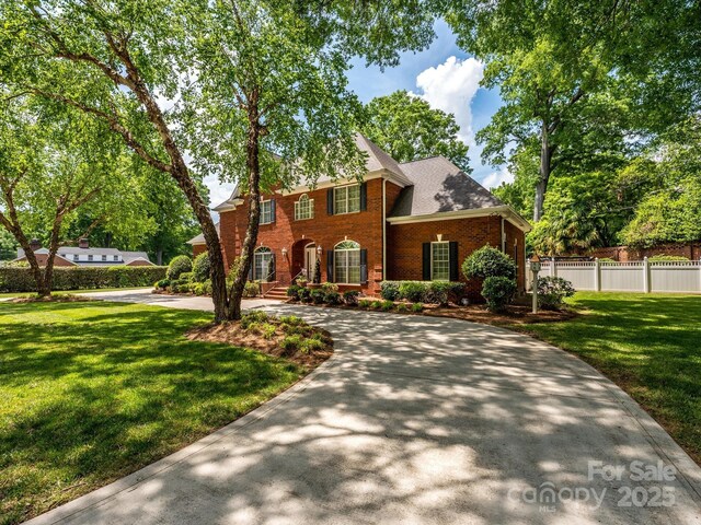 1209 S S St, Gastonia, NC 28052 - colonial inspired home with brick siding and curved driveway