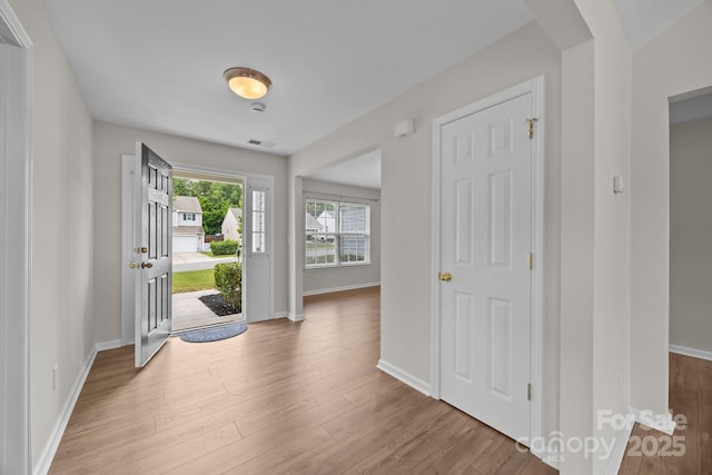 423 Courtland Ct, Kannapolis, NC 28081 - entryway with wood finished floors, baseboards, and arched walkways