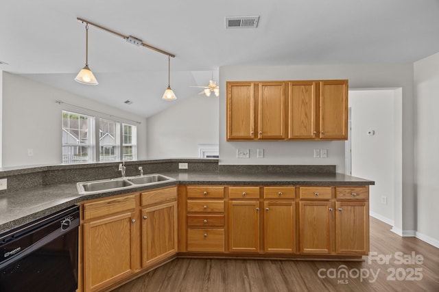 423 Courtland Ct, Kannapolis, NC 28081 - kitchen featuring a sink, dishwasher, dark wood finished floors, a ceiling fan, and dark countertops