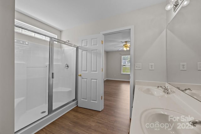 423 Courtland Ct, Kannapolis, NC 28081 - full bath with wood finished floors, a shower stall, double vanity, and a ceiling fan