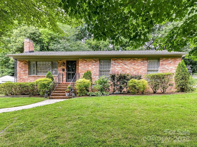 1638 Wensley Dr, Charlotte, NC 28210 - ranch-style house featuring a chimney, a front lawn, and brick siding