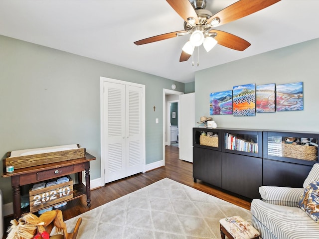 1638 Wensley Dr, Charlotte, NC 28210 - living area featuring ceiling fan, wood finished floors, and baseboards