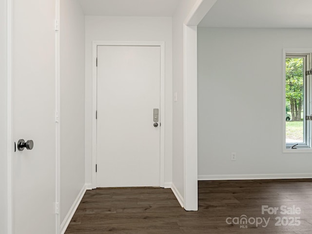 406 Wilcrest Dr, Matthews, NC 28105 - entryway featuring dark wood-style floors and baseboards