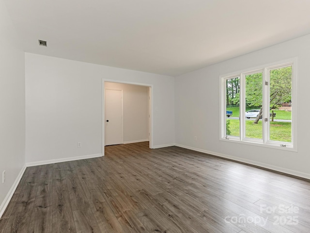 406 Wilcrest Dr, Matthews, NC 28105 - empty room with dark wood-style flooring and baseboards