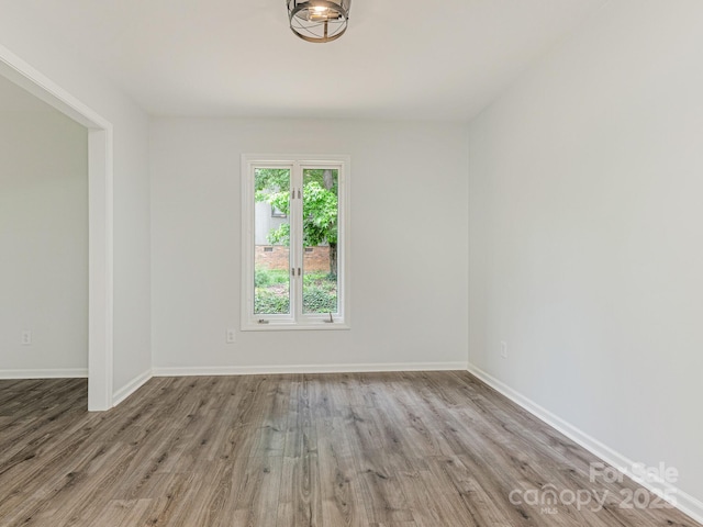 406 Wilcrest Dr, Matthews, NC 28105 - empty room with wood finished floors and baseboards