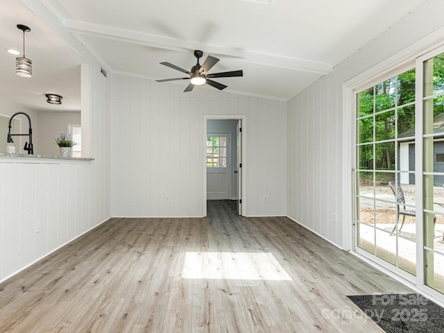 406 Wilcrest Dr, Matthews, NC 28105 - unfurnished living room featuring wood finished floors and a ceiling fan