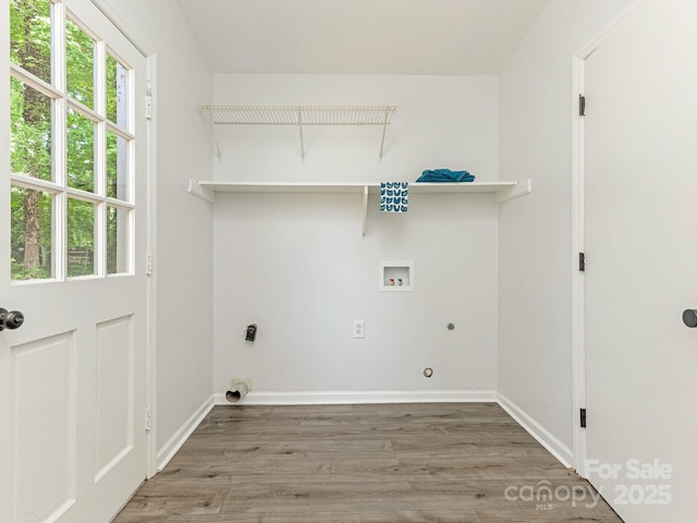 406 Wilcrest Dr, Matthews, NC 28105 - laundry area with hookup for a washing machine, wood finished floors, electric dryer hookup, and hookup for a gas dryer