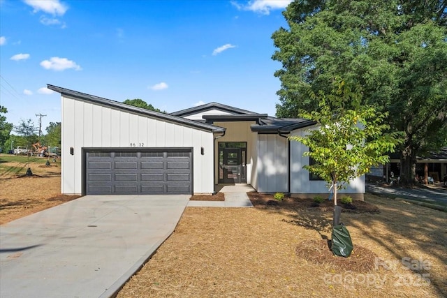 8632 Cedarbrook Dr, Charlotte, NC 28215 - view of front of house featuring an attached garage and driveway