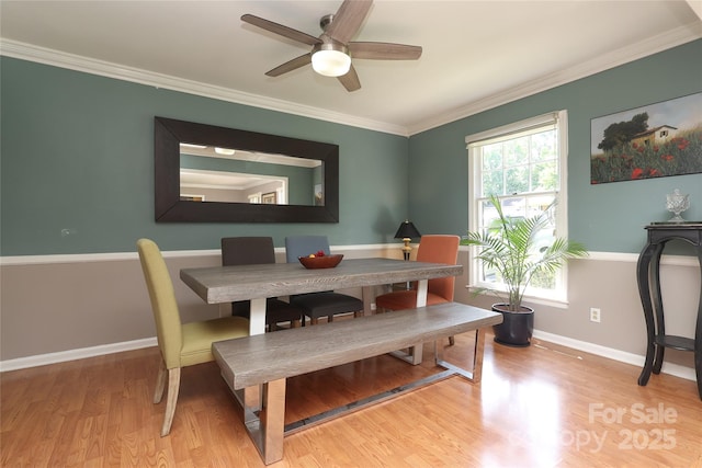 2443 Knickerbocker Dr, Charlotte, NC 28212 - dining space with wood finished floors, ornamental molding, and ceiling fan
