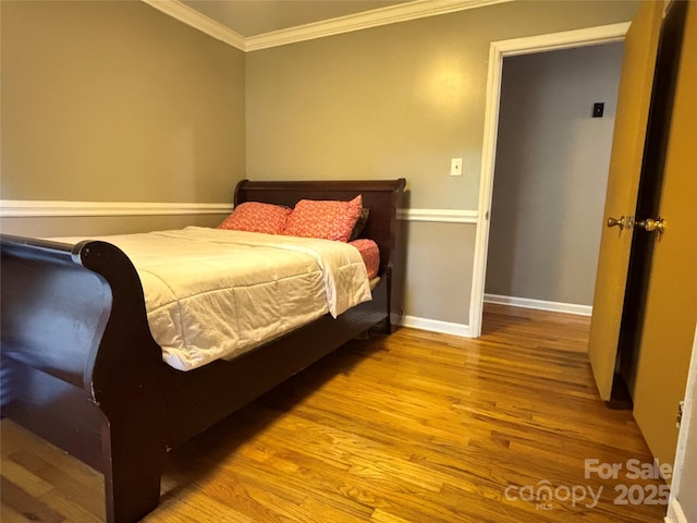 2443 Knickerbocker Dr, Charlotte, NC 28212 - bedroom with crown molding and wood finished floors