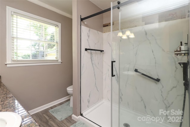 2443 Knickerbocker Dr, Charlotte, NC 28212 - bathroom with a marble finish shower, vanity, wood finished floors, and crown molding