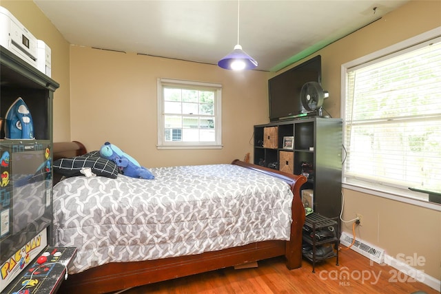 2443 Knickerbocker Dr, Charlotte, NC 28212 - bedroom featuring wood finished floors