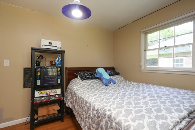 2443 Knickerbocker Dr, Charlotte, NC 28212 - bedroom featuring wood finished floors and baseboards