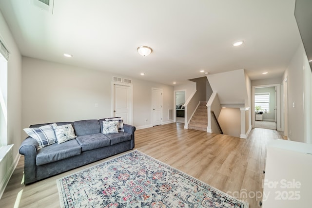 113 Summerhill Dr, Mooresville, NC 28115 - living area with light wood-style floors, baseboards, stairs, and recessed lighting