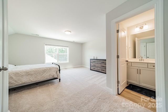 113 Summerhill Dr, Mooresville, NC 28115 - bedroom featuring baseboards, carpet floors, ensuite bathroom, and a sink