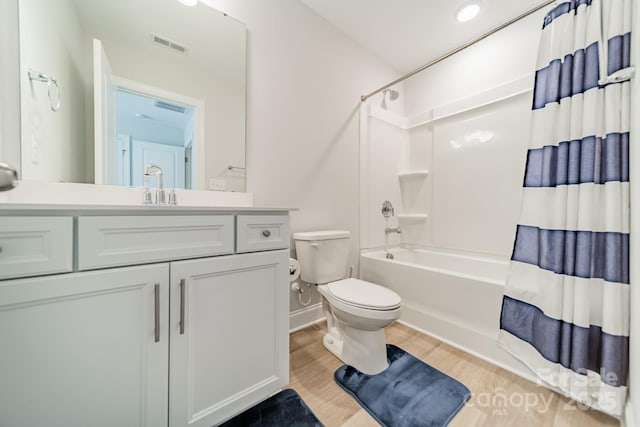 113 Summerhill Dr, Mooresville, NC 28115 - full bath with toilet, shower / tub combo with curtain, wood finished floors, vanity, and baseboards