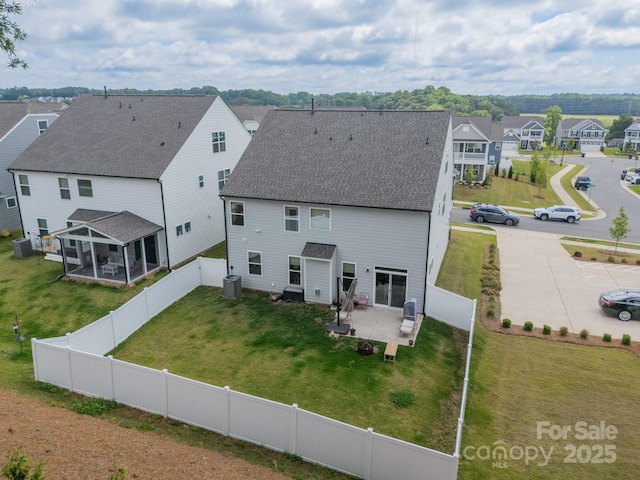 113 Summerhill Dr, Mooresville, NC 28115 - back of property featuring central AC unit, a shingled roof, a residential view, and a patio