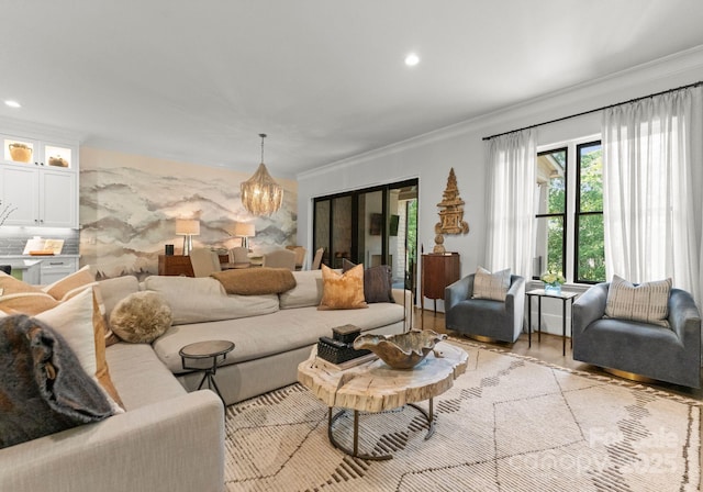 1160 S Kings Dr, Charlotte, NC 28207 - living room with ornamental molding, recessed lighting, and a chandelier