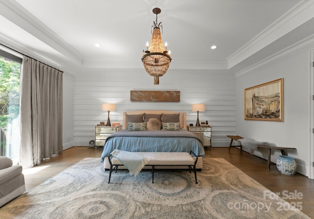 1160 S Kings Dr, Charlotte, NC 28207 - bedroom with wood finished floors, recessed lighting, a chandelier, crown molding, and baseboards