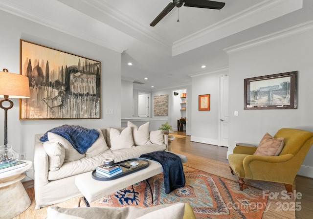 1160 S Kings Dr, Charlotte, NC 28207 - living area featuring crown molding, wood finished floors, a ceiling fan, recessed lighting, and a raised ceiling