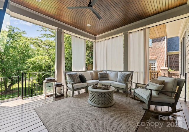 1160 S Kings Dr, Charlotte, NC 28207 - sunroom with crown molding, outdoor lounge area, wooden ceiling, a ceiling fan, and a wooden deck