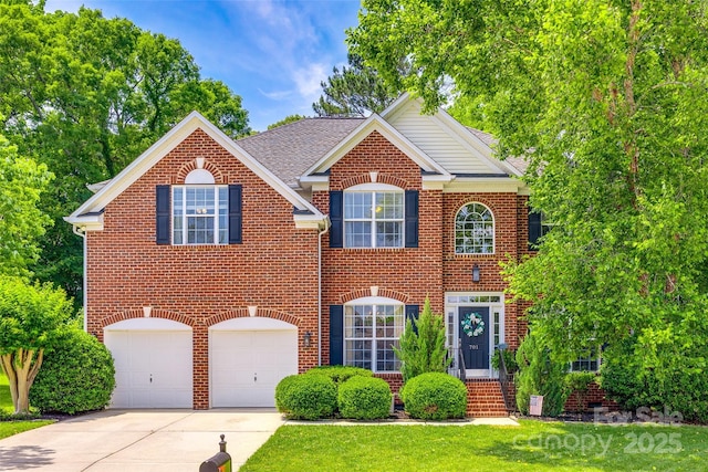 701 Larkridge Ct, Rock Hill, SC 29730 - view of front of house with an attached garage, concrete driveway, and brick siding