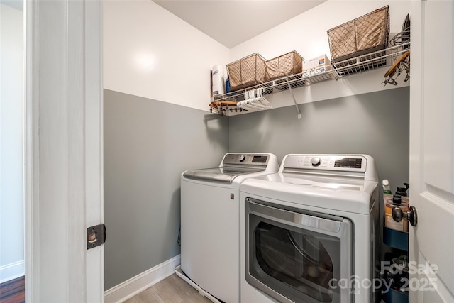 701 Larkridge Ct, Rock Hill, SC 29730 - laundry room with washing machine and dryer, light wood-type flooring, and baseboards