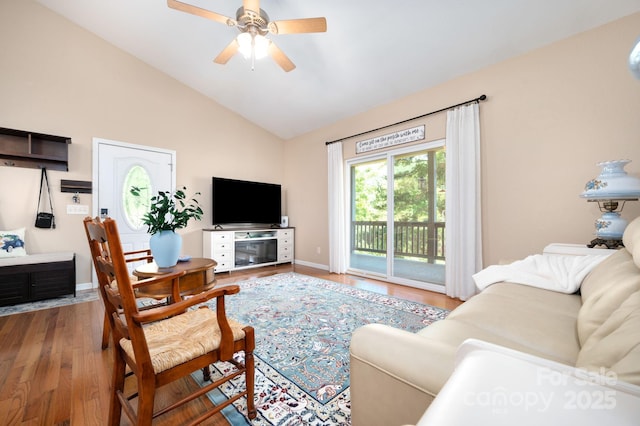 174 Diamond Pt, Canton, NC 28716 - living room with wood finished floors, a ceiling fan, baseboards, and high vaulted ceiling