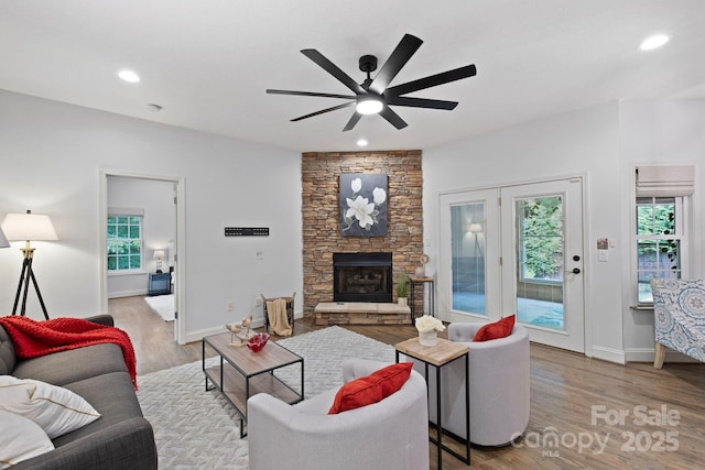 21 Hope Rd, Weaverville, NC 28787 - living area with a ceiling fan, light wood-style flooring, recessed lighting, a fireplace, and baseboards