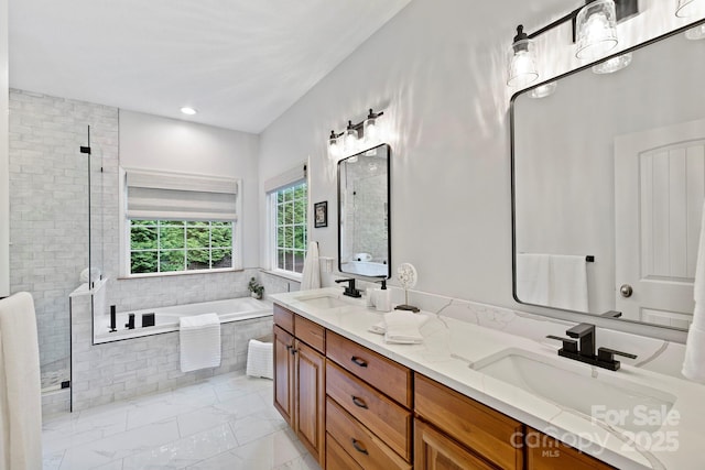21 Hope Rd, Weaverville, NC 28787 - bathroom featuring double vanity, a bath, a shower stall, marble look tiles, and recessed lighting
