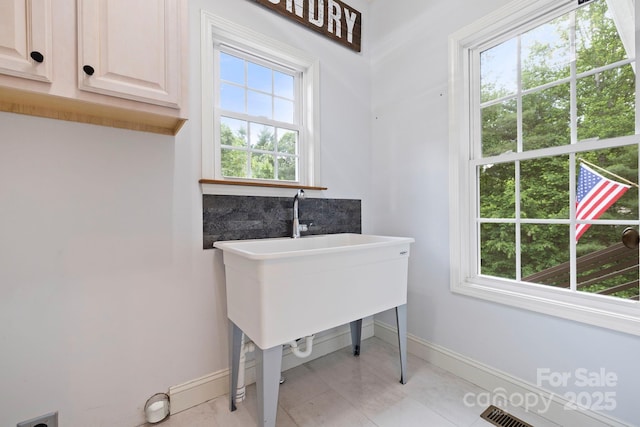 21 Hope Rd, Weaverville, NC 28787 - bathroom featuring baseboards, decorative backsplash, and tile patterned flooring