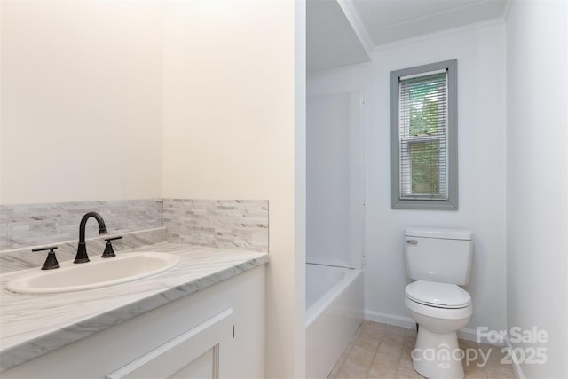4648 Rifle Range Rd, Conover, NC 28613 - bathroom featuring toilet, vanity, crown molding, baseboards, and tile patterned floors